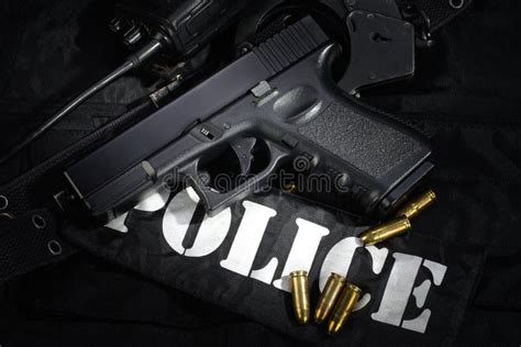 Police Weapon And Equipment On Black Uniform Stock Image Image Of