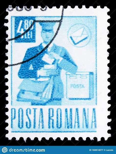 Postage Stamp Printed In Romania Shows Postman On Round Postal And