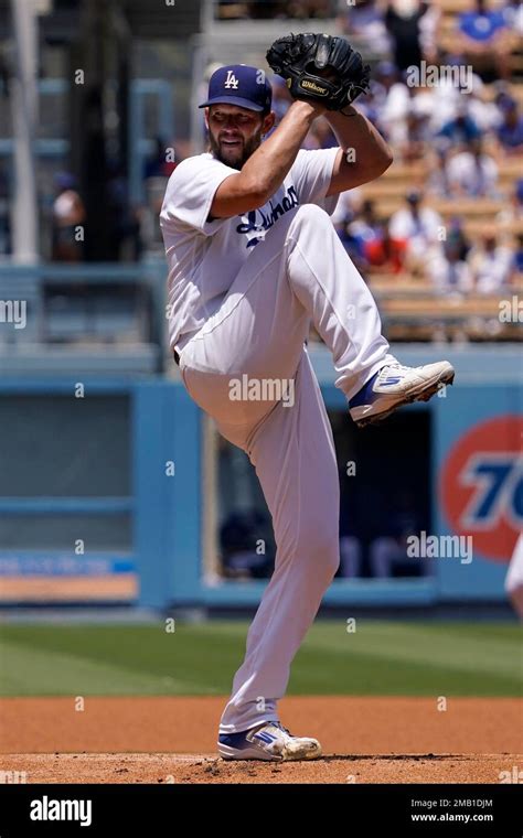 Los Angeles Dodgers Starting Pitcher Clayton Kershaw Throws To The Plate During The First Inning