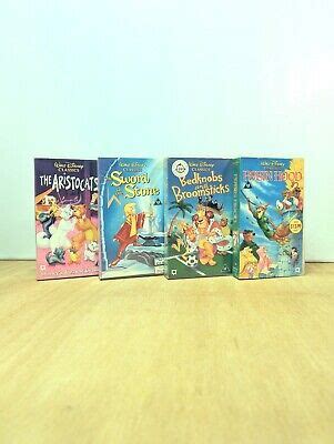 Disney Vhs Video Bundle Of Aristocats Robin Hood Bedknobs Sword