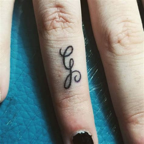 Cursive Letter G Tattoo