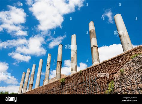 Temple of Venus and Roma ancient ruins and columns with clouds, in the center of Rome Stock ...