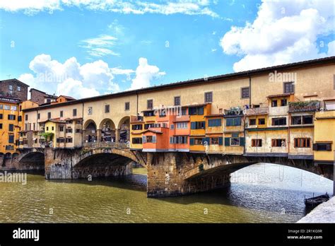 The Ponte Vecchio A A Medieval Stone Bridge Over The Arno River That