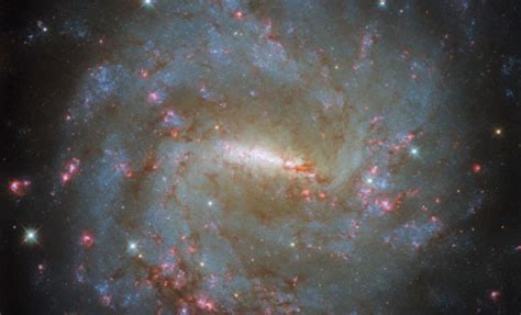 Hubble Reveals Stunning Galaxy Concealing The Mysteries Of Star Formation