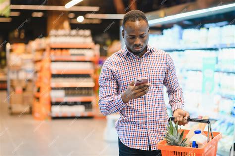 Premium Photo African Man Shopping At Supermarket Handsome Guy