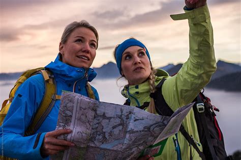 "Two Female Hiker Reading A Hiking Map Planing A Route" by Stocksy ...