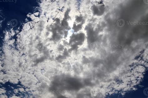 Beautiful View At Sunbeams With Some Lens Flares And Clouds In A Blue