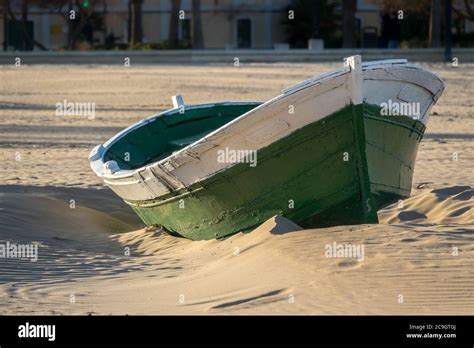 Wrecked Wooden Fisher Boat Boat Stranded In The Sand Of A Beach Broken