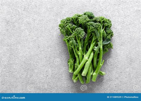 Broccolini Fresh Bunch Of Broccoli Sprouts On A Cooking Table Stock