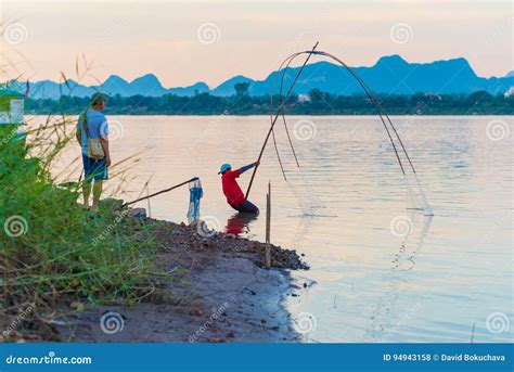 Fishing on Mekong editorial stock photo. Image of person - 94943158