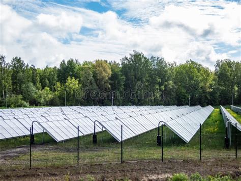 Field Of PV Solar Panels Providing Alternative Green Energy Used For