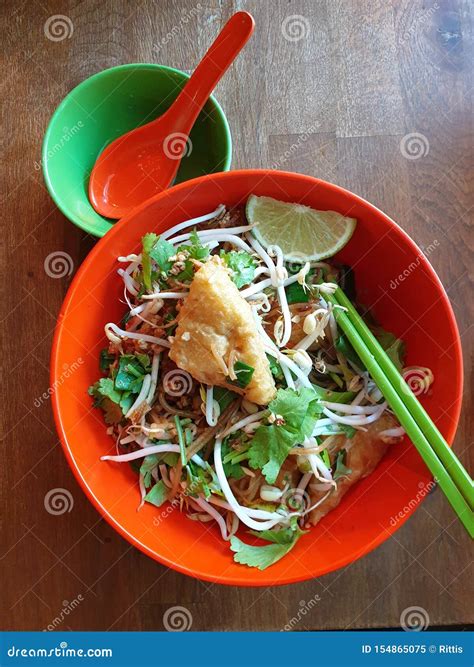 Top View Of Tofu In Peanut Garlic Sauce And Dynamite Lumpia. Philippine Appetizers Or Food ...