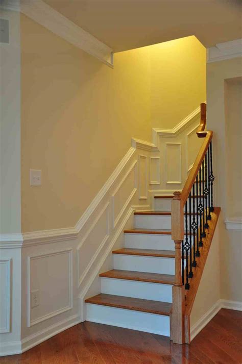 Finish And Trim Carpenters For Crown Molding And Iron Balusters In