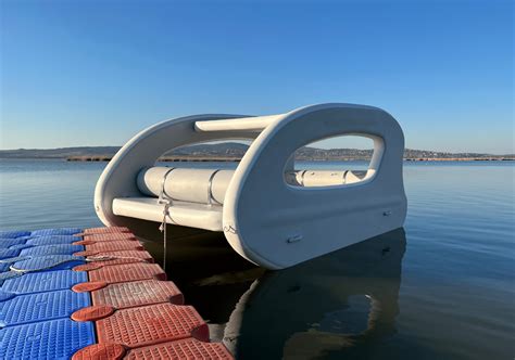 Inflatable 2-story e-catamaran party lounge packs down into car trunk