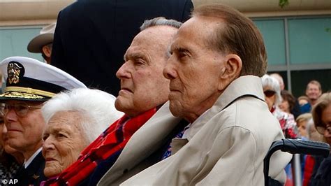 Hero Salutes Hero Bob Dole Is Helped Out Of His Wheelchair So He Could Stand In Tribute To Bush