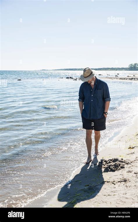 Man Walking Along Hi Res Stock Photography And Images Alamy