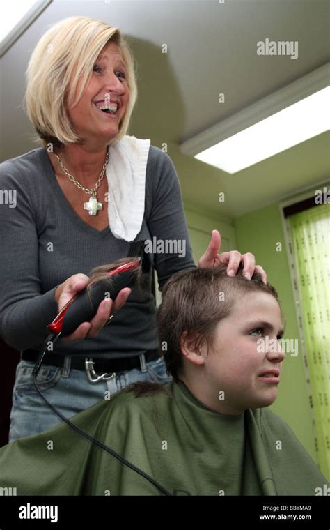 Kid Getting A Haircut Stock Photo Alamy