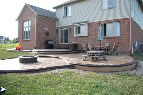 Custom Designed Stamped Concrete Patio Wbuilt In Fire Pit Concrete Patio Makeover Concrete