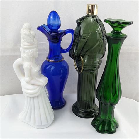 Set Of 4 Vintage Avon Cologne Bottles