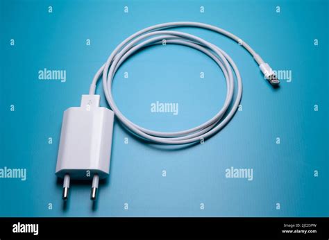 Apple iPhone lightning charger and cable for charging Stock Photo - Alamy