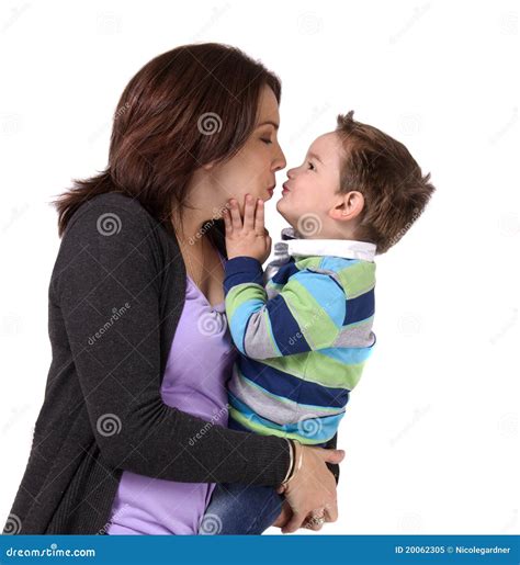 Portrait Of A Mother Kissing Her Son Stock Image Image Of Expressive