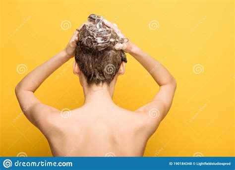Back View Of Nude Woman Washing Hair With Shampoo Stock Photo Image