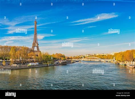 Paris France City Skyline At Eiffel Tower And Seine River Debilly