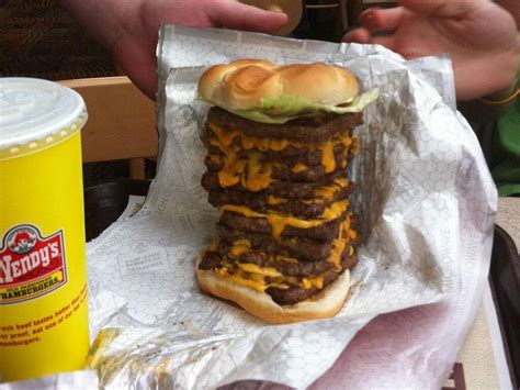 Manitoba Wendy's outlet axes nine-patty 'T-Rex' cheeseburger from menu ...