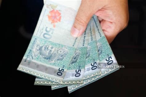 Ringgit Opens Slightly Lower Against Us Dollar After Fed Leaves