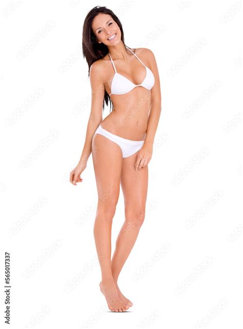 Full Length Shot Of A Beautiful Brunette Model In A Bikini Standing And Posing Against The