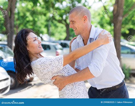 Woman And Man Hugging In Parking Lot Stock Image Image Of Wife Asian