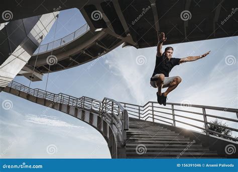 Man Doing Parkour In City Stock Photo Image Of Millennials 156391046