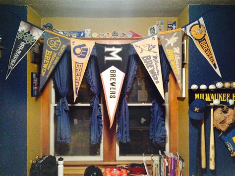 Baseball pennant display in my Brewer room. | Baseball display ...