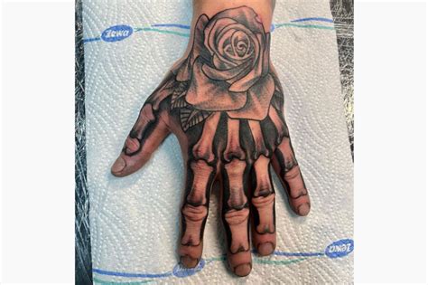 Update 80+ rose hand tattoo with skeleton fingers latest - in.cdgdbentre