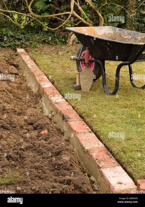 brick edging garden Stock Photo - Alamy