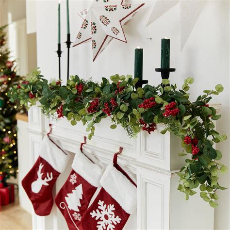 Amazon Zeyune 6 FT Pre Lit Artificial Christmas Garland With LED