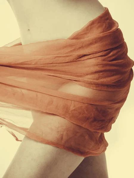 Woman Naked Body With Red Silk Textile On Hips Stock Photo By