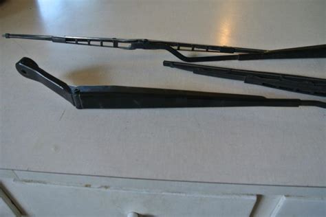 Sell 00 05 Mitsubishi Eclipse OEM Windshield Wiper Arms With Blades X2