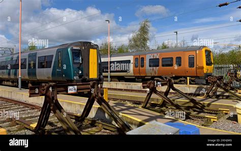 Lnwr Class 350 Siemens Desiro Electric Train And West Midlands Railway Class 323 Emu Train In