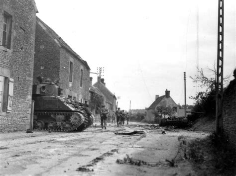 A Sherman Of The South Alberta Regiment 4th Canadian Armoured Division Pokes Its Nose Out From