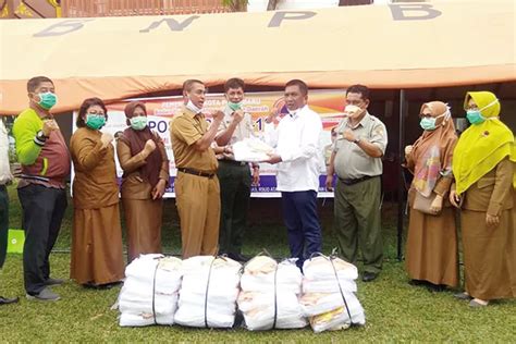 LPJKP Riau Berikan Bantuan APD Untuk 21 Puskesmas Di Pekanbaru Riau Pos