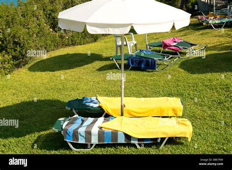 Bagged By Towels But Empty Sunbeds Loungers Stock Photo Alamy