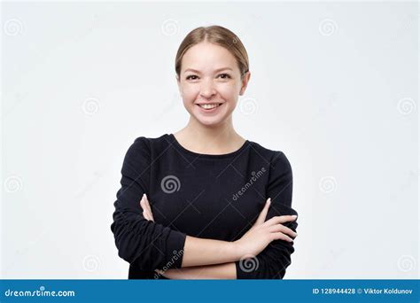 Portrait Of Young Beautiful Cute Cheerful Girl Smiling Looking At