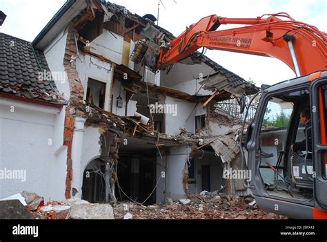 Demolition excavator hi-res stock photography and images - Alamy