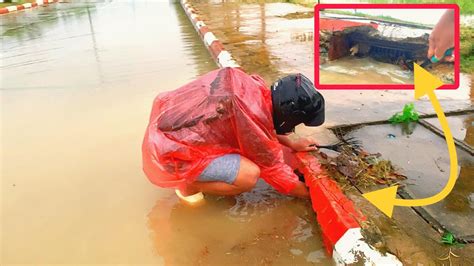 Drain Savior Conquering Mud And Trashes To Prevent Street Flooding