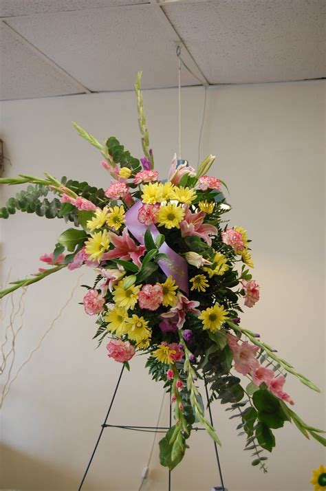 This Standing Spray Features Eucalyptus Yellow Daisies Pink