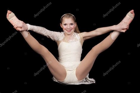 Young girl dance sit hold legs up — Stock Photo © alanpoulson #41411807