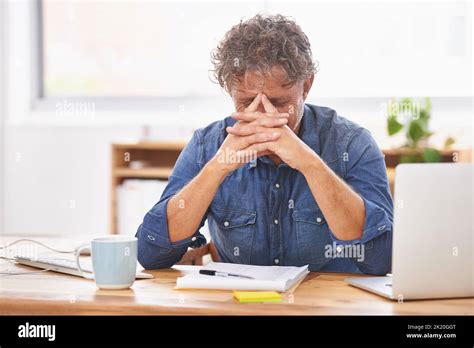 Extremely Tired By Friday A Mature Businessman Looking Tired While