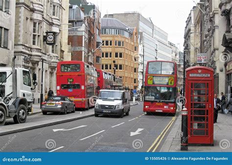 Taxi and Red Bus in London editorial photo. Image of traffic - 15505426