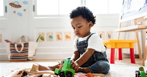 When Do Babies Really Start Playing With Toys? An Expert Explains